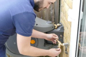 plumber-installing-new-garden-tap